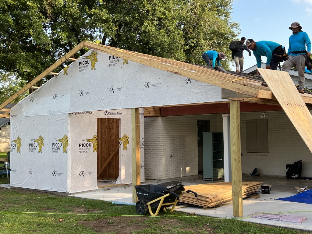 Home addition wrapped before siding